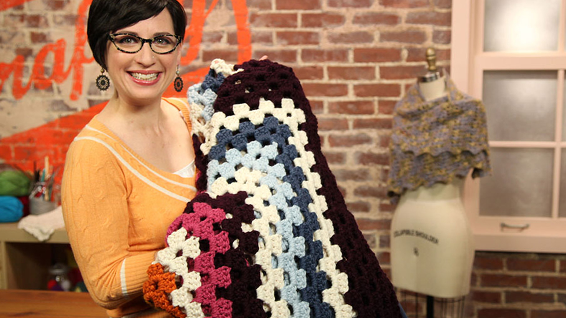 Woman with a crochet blanket
