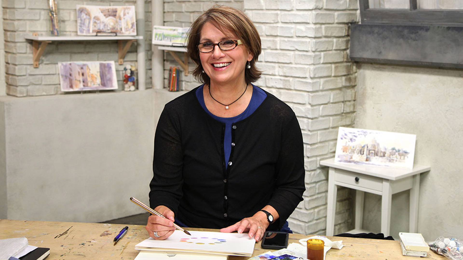 Woman painting with water color