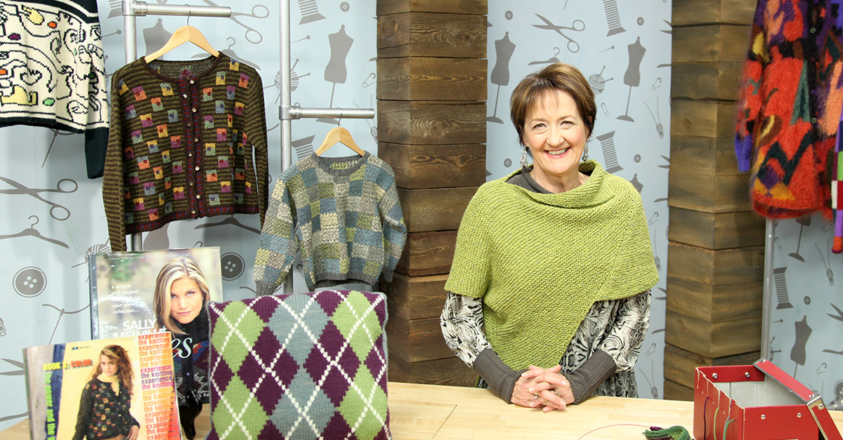 Woman with hanging intarsia projects